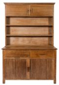 A Heals type limed oak dresser:,