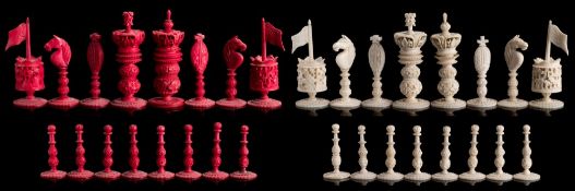 A late 19th century Macau ivory Burmese pattern chess set: one side stained red,