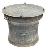 A Burmese bronze rain drum: of waisted circular form,
