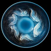 A Lalique plate 'Ondines': of opalescent circular form with raised central boss decorated in relief