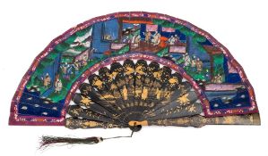 A Cantonese black lacquer and paper fan: the painted paper leaf decorated with figures with ivory