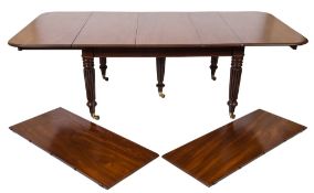 A late Regency mahogany extending dining table:, with a telescopic action,