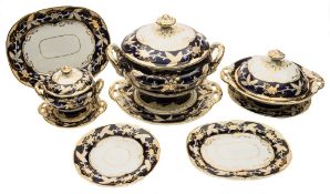 A Davenport Opaque China dinner service: with gilt embellished flowering prunus on a royal blue