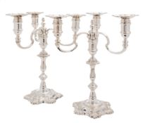 A pair of Elizabeth II silver three-branch candelabra, maker J B Chatterley & Sons Ltd, Birmingham,