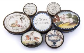 A collection of seven South Staffordshire enamel patch boxes: decorated with various mottos and