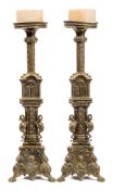 A large pair of 19th century brass candlesticks: in the Italianate style,