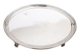 A George III silver stand, maker Timothy Renou, London, 1794: monogrammed, of oval outline,