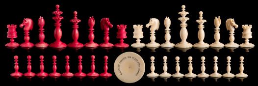 A 19th century ivory Calvert pattern chess set: one side stained red, the other side left natural,