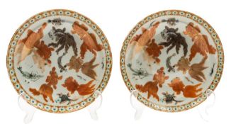 A pair of Chinese fish-decorated dishes: each painted in iron-red, grey,