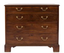 A George III mahogany rectangular chest:, the top with a moulded edge,