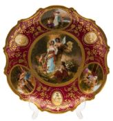 A 'Vienna' porcelain plate: of silver shape the centre decorated with Cupid Psyche and others with