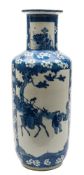 A Chinese blue and white rouleau vase: painted with rectangular panels and medallions of a