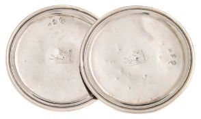 A pair of George I Irish silver patens, maker John Hamilton, Dublin, 1723: crested,