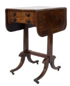 A Regency rosewood and inlaid drop flap work table:, bordered with boxwood and brass lines,