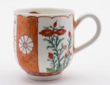 A First Period Worcester coffee cup: painted in the 'Scarlet Japan' pattern with panels of prunus