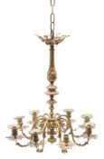 A gilt brass eight-branch chandelier: with foliate decorated urn-shaped nozzles,