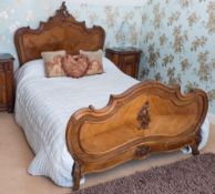A French carved walnut double bed in the Louis XV provincial taste:,