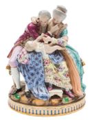A Meissen family group 'The Lucky Parents': after the model by Michel Victor Acier,
