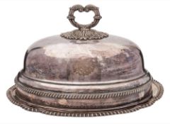 A silver plated meat dish and cover: crested, of oval outline with gadrooned borders, 42cm.