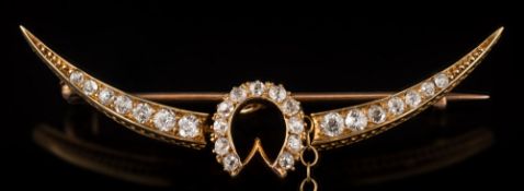 A late 19th century gold and diamond crescent brooch: with central horseshoe motif,