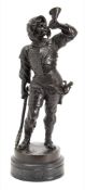 An early 20th century bronze figure of a Renaissance soldier: blowing a trumpet,