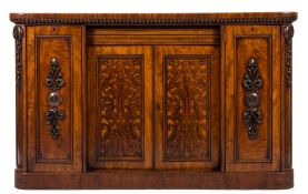 A Victorian mahogany low side cabinet:, the top with rounded corners and a reeded dentil edge,