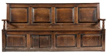 An early 18th century oak box settle:,