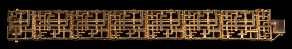 A Modernist gold bracelet: 21mm wide x 17cm long, approximately 55gms gross weight.
