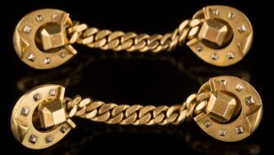 A pair of 'Mesiter' horseshoe motif cuff-links: stamped '750', 21.5gms gross weight.