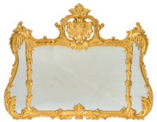A carved giltwood cartouche shaped mirror:,