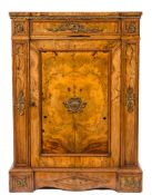 A Victorian walnut and gilt metal mounted pier cabinet:,