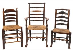 A set of four early 19th century elm and ash ladderback dining chairs:,