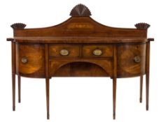 An early 19th Century mahogany and inlaid sideboard:, of D-shaped breakfront outline,