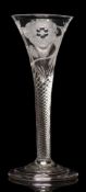 An English wine glass of Jacobite interest: the trumpet shaped bowl engraved with a rose and buds