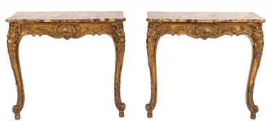 A pair of French carved giltwood rectangular console tables:,