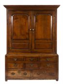A mid 18th Century oak side cupboard:,