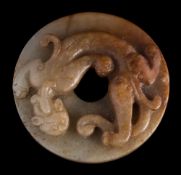 A Chinese 'chilong' jade disc, bi: in the Ming manner, carved with a single chilong,
