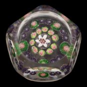 A Clichy miniature paperweight: set with two concentric rings of coloured canes around a central