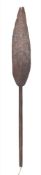 A Soloman Islands Buka paddle: of traditional design, the broad blade carved with mask decoration,