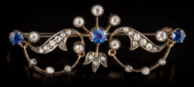 A 19th century sapphire and diamond bar brooch: 47mm total length and suspending diamond-set