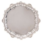 A George III silver circular waiter, maker Ebenezer Coker, London,