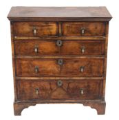 An early 18th Century walnut and feather banded rectangular chest:,