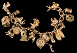 A 9ct gold charm bracelet: with nineteen various attached charms to include seated bear,