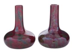 A pair of Ruskin high fired miniature bottle vases: by William Howson Taylor,
