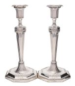 A pair of George V silver candlesticks, maker John Round & Sons Ltd,