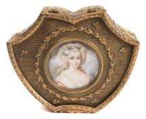 A French gilt metal casket: of cartouche outline,