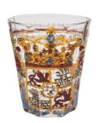 A Central European soda glass beaker: the vertically ribbed exterior enamelled in colours with an