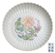 A Chinese yellow ground famille rose 'peony' dish: with fluted rim,