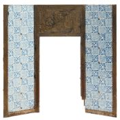 An iron fireplace of canted design:,