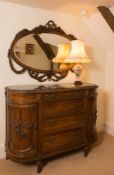 An extensive French carved walnut ten piece bedroom suite:,